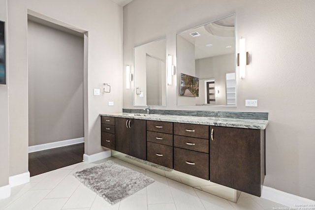 bathroom featuring vanity and tile patterned floors