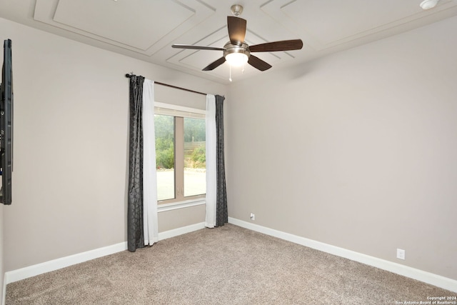 unfurnished room featuring ceiling fan and carpet floors