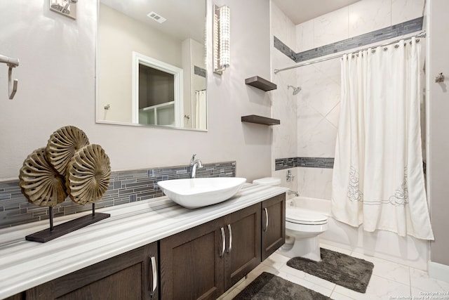 full bathroom with shower / bath combination with curtain, vanity, and toilet