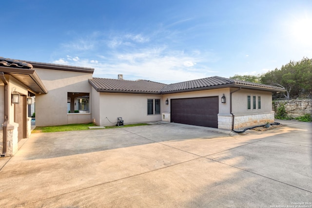 view of front of home with a garage