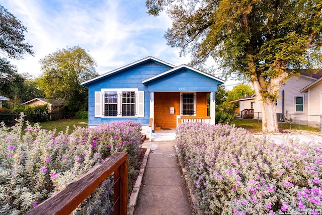 bungalow-style home with covered porch