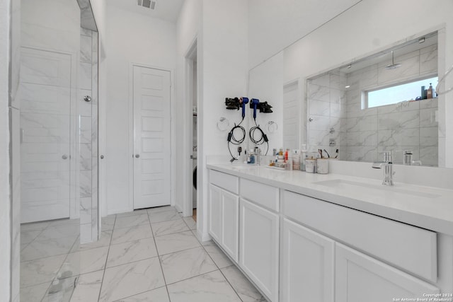 bathroom with vanity and an enclosed shower