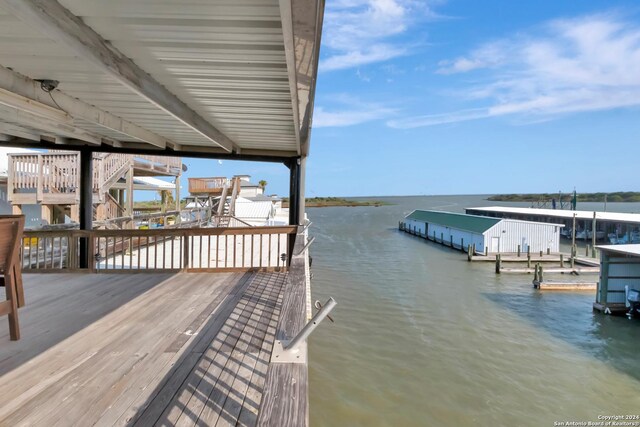 dock area with a water view