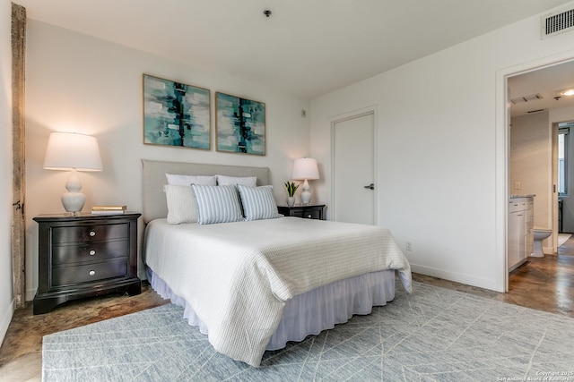 bedroom featuring ensuite bath