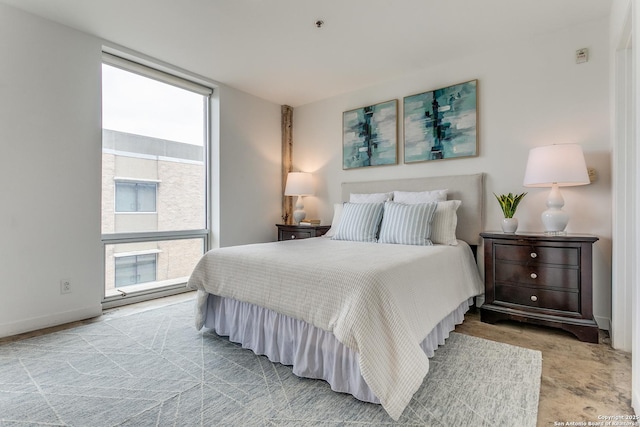 bedroom featuring multiple windows