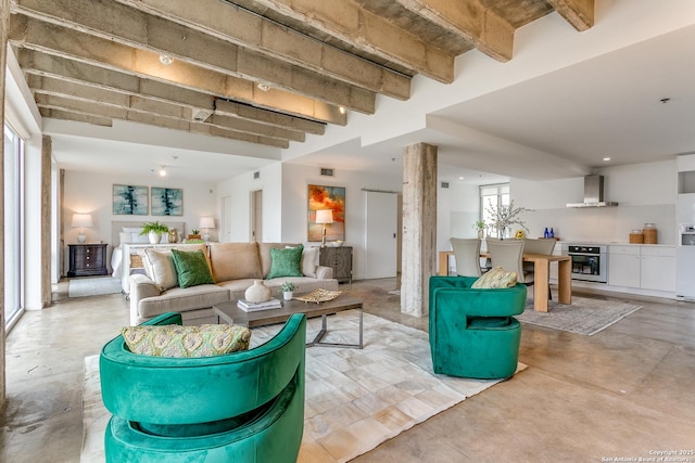 living room featuring beam ceiling