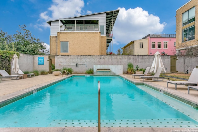 view of pool with a patio