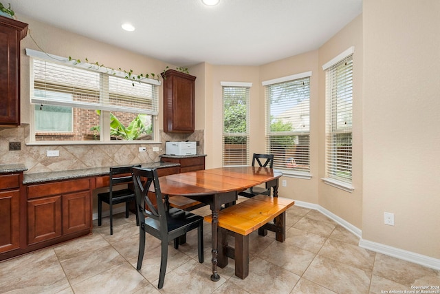 tiled dining room with built in desk