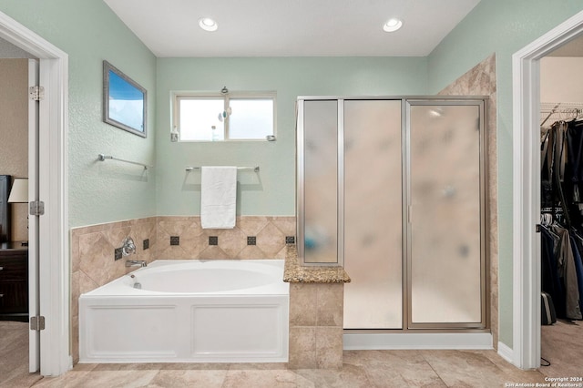 bathroom featuring plus walk in shower