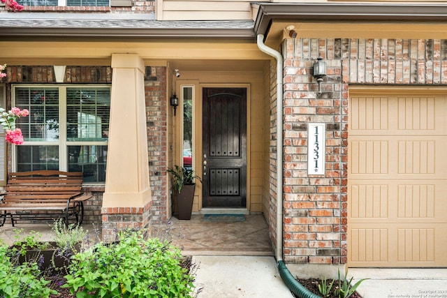 property entrance featuring covered porch