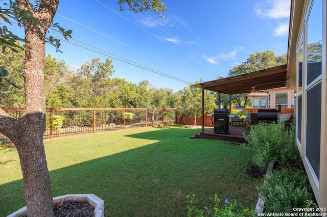 view of yard with a deck