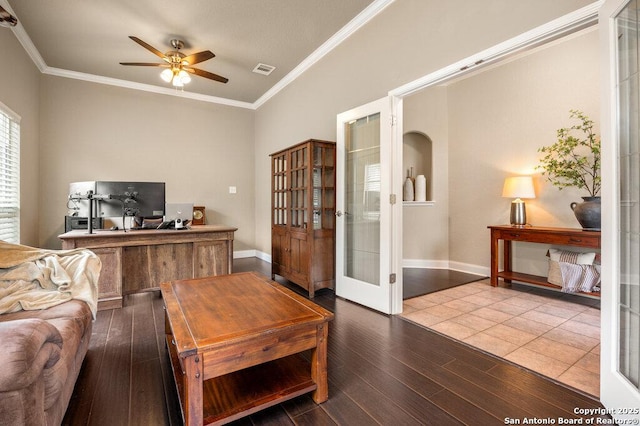 living room with french doors, ornamental molding, and ceiling fan