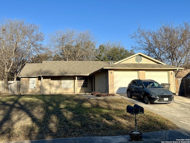 ranch-style house with a front lawn and a garage