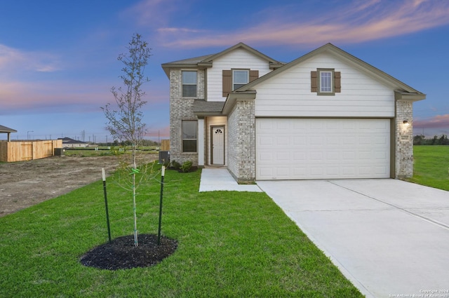 view of front of home with a lawn