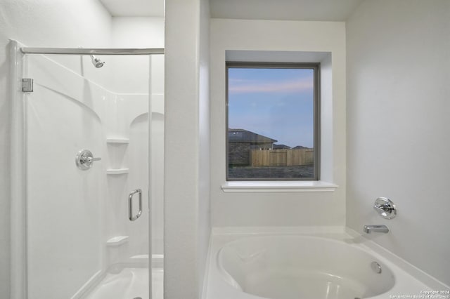 bathroom with independent shower and bath