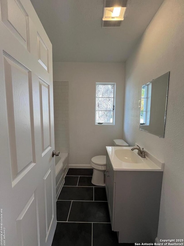 full bathroom featuring tile patterned floors, vanity, toilet, and independent shower and bath