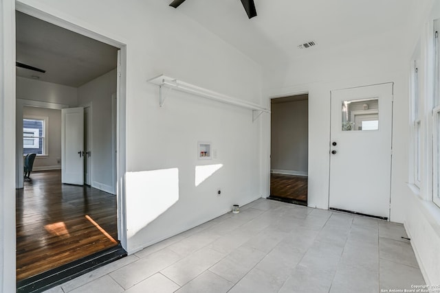 foyer entrance with light tile patterned floors