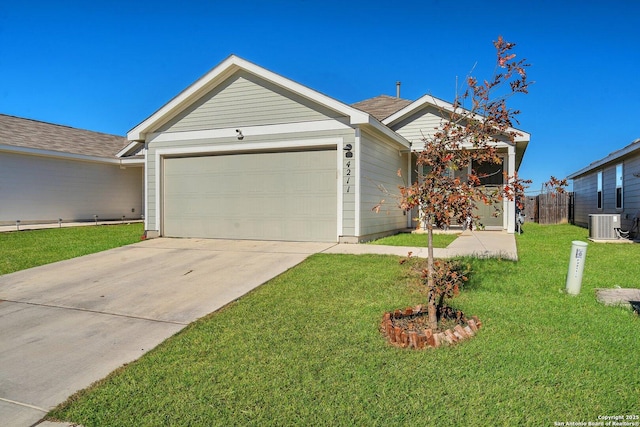 ranch-style home featuring a garage and a front yard