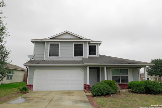 view of front of property with a garage