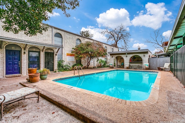 view of pool featuring a patio area