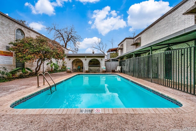 view of pool with a patio