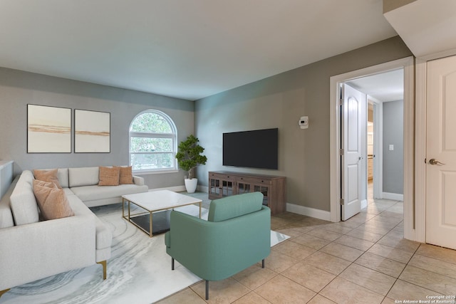 living room with light tile patterned floors