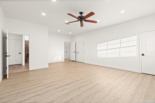 unfurnished bedroom with light hardwood / wood-style flooring and ceiling fan