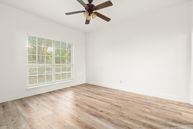 empty room featuring light hardwood / wood-style floors and ceiling fan