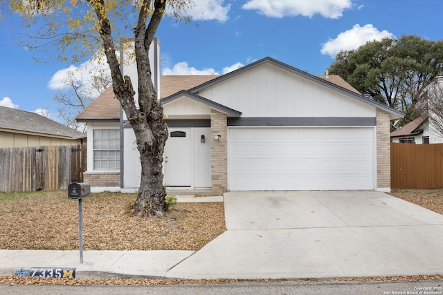 ranch-style home featuring a garage