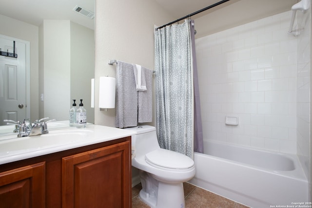 full bathroom featuring shower / bathtub combination with curtain, tile patterned flooring, vanity, and toilet