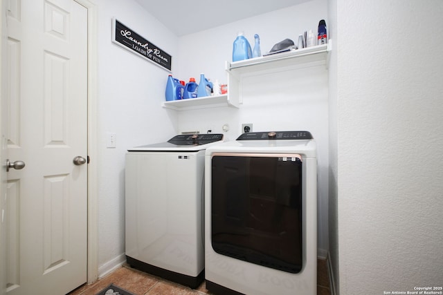 washroom featuring washer and dryer