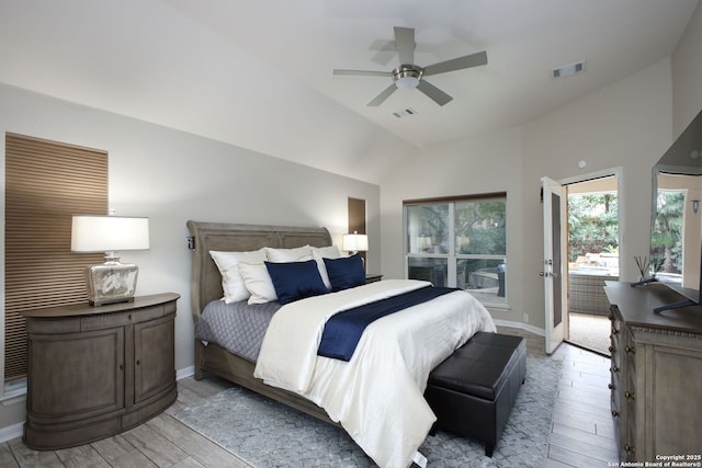 bedroom featuring ceiling fan and lofted ceiling