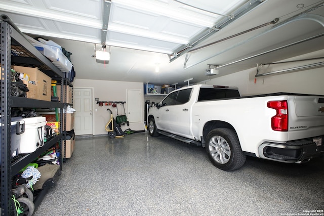 garage featuring a garage door opener