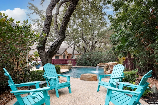 view of swimming pool featuring pool water feature