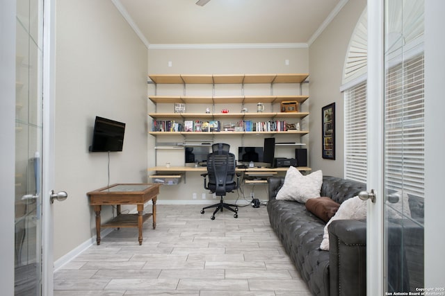 office space featuring built in desk, ornamental molding, and french doors