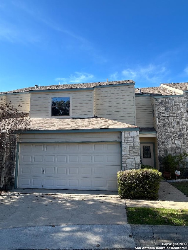 view of front of home with a garage