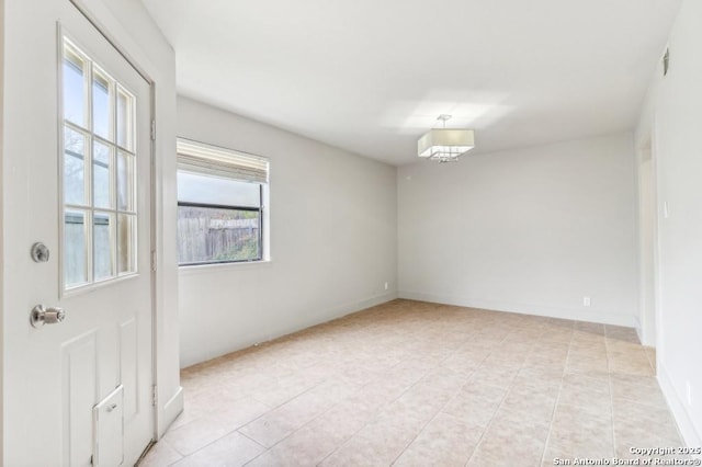 view of tiled empty room