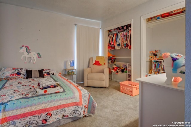 carpeted bedroom with a closet