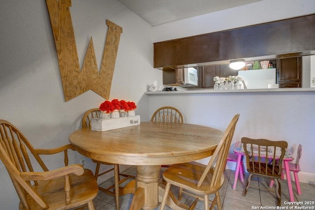 view of tiled dining area