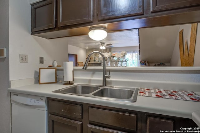 kitchen with dishwasher, dark brown cabinets, ceiling fan, and sink