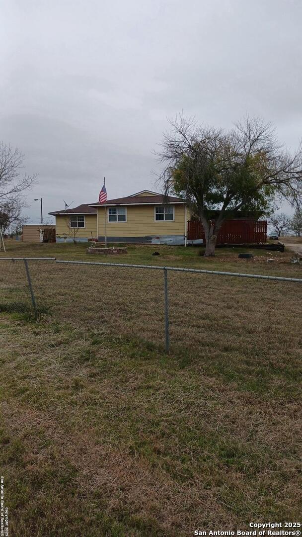 view of front of property with a front lawn