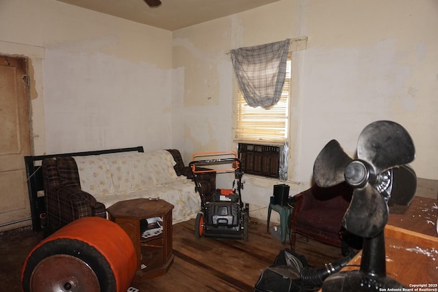 sitting room with hardwood / wood-style floors