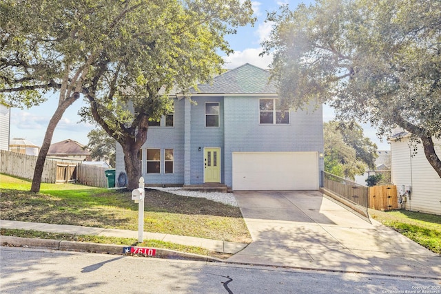 view of front of home with a garage