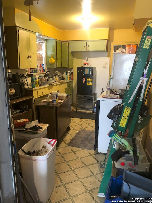 kitchen featuring washer / dryer