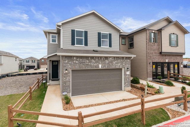 view of front of home with a garage