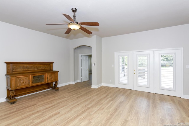 interior space with ceiling fan and light hardwood / wood-style flooring