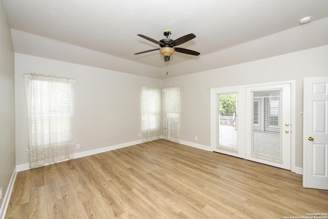 unfurnished room featuring ceiling fan and light hardwood / wood-style flooring