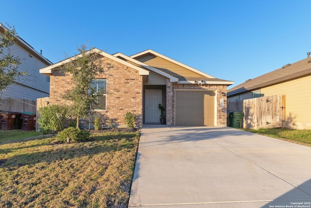 view of front facade featuring a front yard and a garage