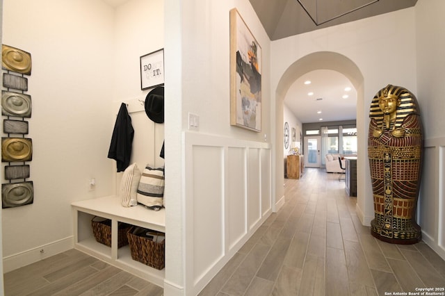 mudroom with wood-type flooring