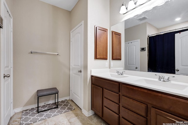 bathroom featuring vanity